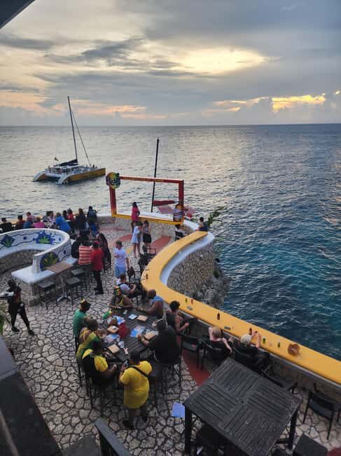 Ricks cafe & 7mile Beach Private Tour from Montego Bay. - Ricks Cafe: Sunset, Cliff Jumping, and Island Vibes