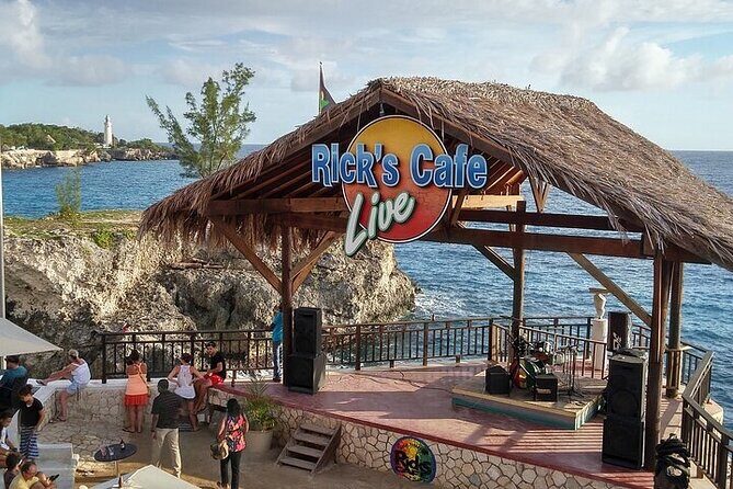 Rick's Cafe and 7 Mile Beach Tour with Transportation - Exploring the Day in Detail