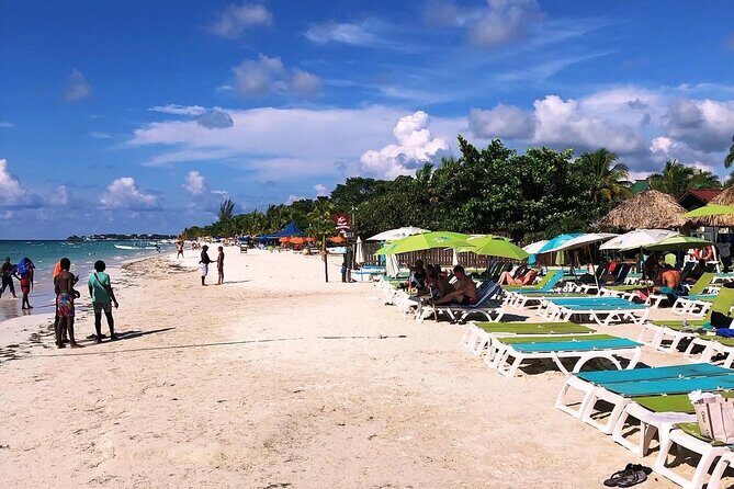 Rick's Cafe and 7 Mile Beach Tour with Transportation - In The Sum Up