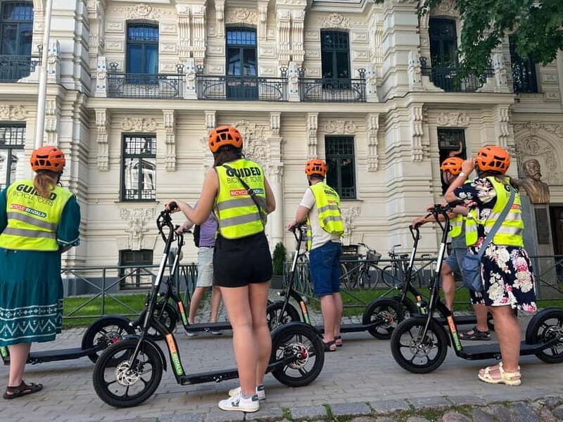 Riga Highlight Big wheel e-scooter Group or Private tour - Key Points