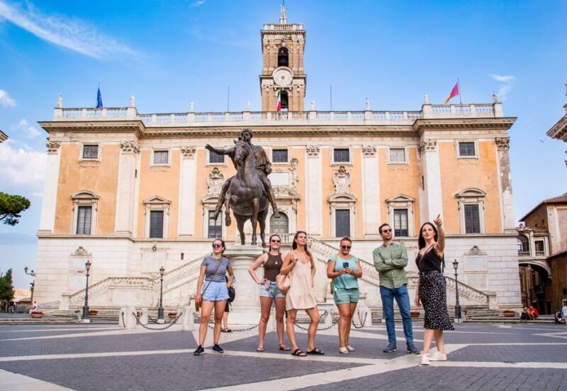 Rome: Ancient Rome Guided Walking Tour Beyond the Colosseum - Strolling Down Via dei Fori Imperiali