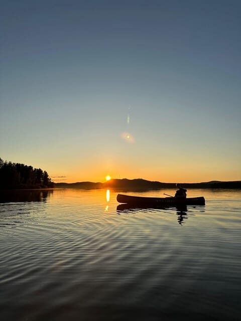 Ruka : Summer evening canoeing on the lake Rukajärvi - The Sum Up