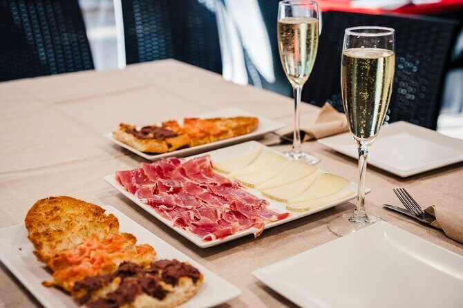 Sagrada Familia Jamon & Tapas Tasting Experience - Key Points