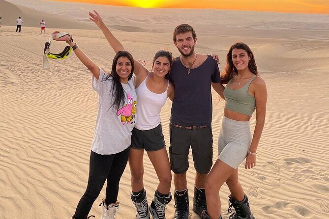 Sandboarding or Sandsky with sunset in Huacachina - The Sum Up