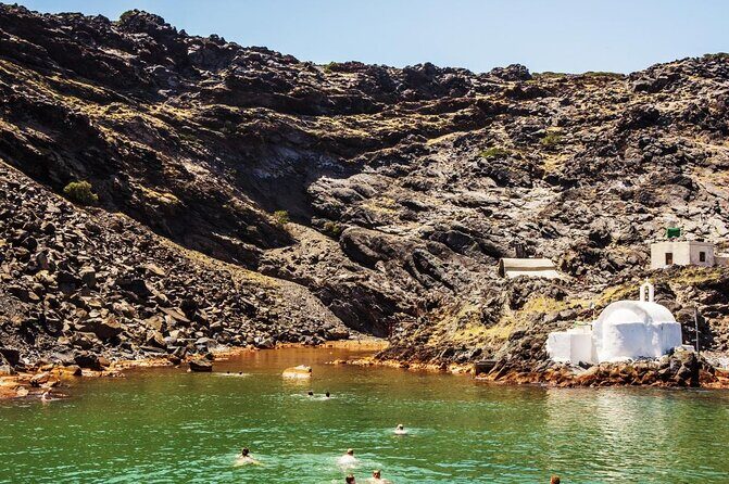 Santorini Caldera Cruise: Swim-Stops, Greek Meal and Sunset Views - Exploring the Santorini Caldera Cruise in Detail