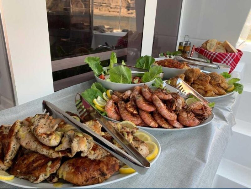Santorini: Caldera Cruise with Greek Meal and Transfer - Who Should Consider This Tour?