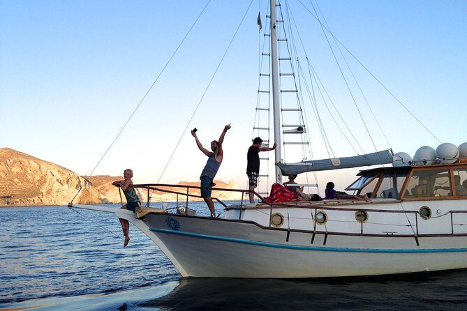 Santorini Caldera Sunset Traditional Cruise with Meal and Drinks - Key Points