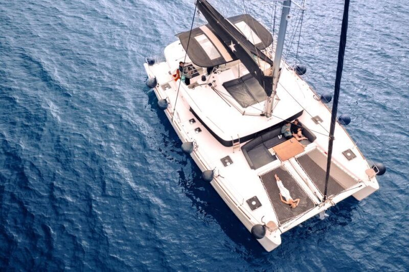Santorini: Catamaran Cruise with Lunch, Drinks, & Oia Visit - Key Points