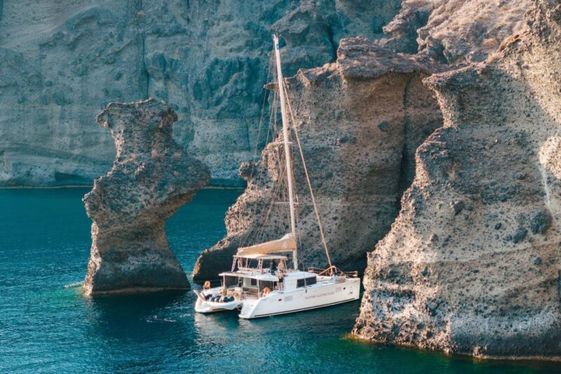 Santorini Catamaran Day Cruise: Lunch, Drinks and Transfers - Frequently Asked Questions
