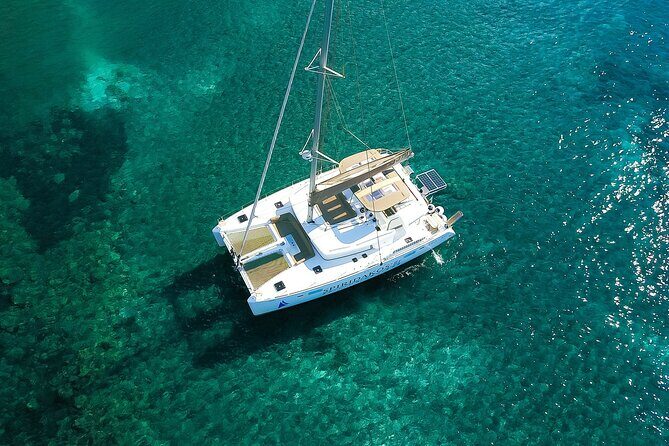 Santorini Classic Catamaran Cruise with BBQ, Drinks and Transfers - Pros and Cons: What to Consider