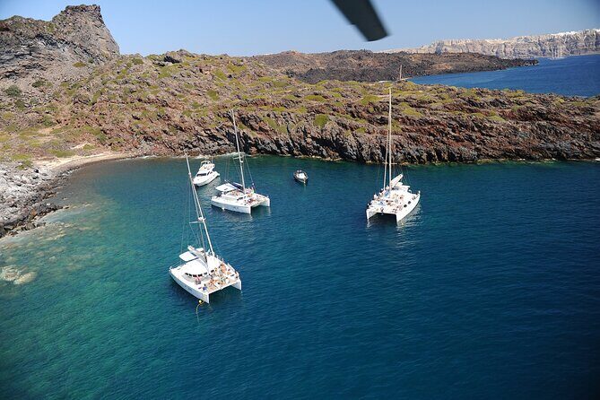 Santorini Classic Catamaran Cruise with BBQ, Drinks and Transfers - Who Should Book This Tour?