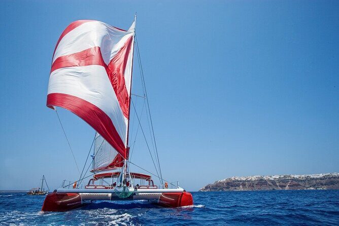 Santorini Cruise on Catamaran with BBQ & Open Bar - Who Should Book This Tour?