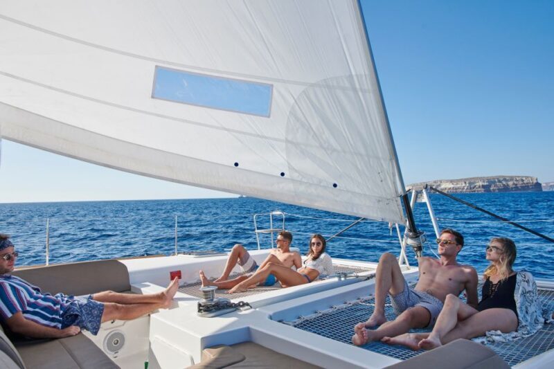 Santorini Gold Catamaran Cruise with Snorkel, BBQ & Open Bar - Who Should Book This Tour?