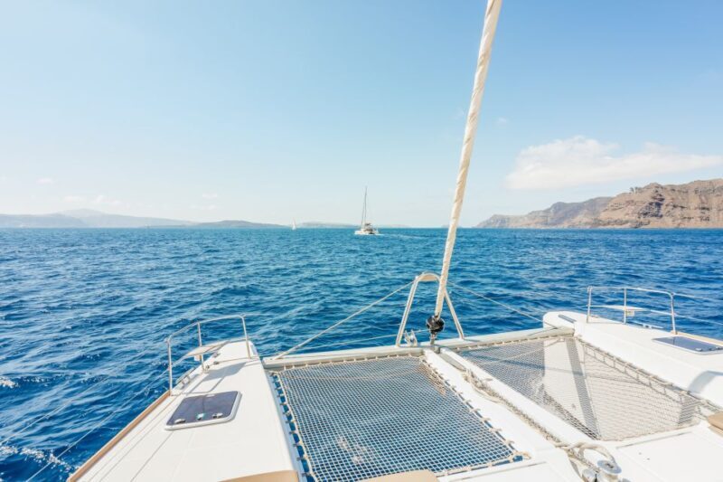 Santorini: Luxury Catamaran Day Trip with Meal and Open Bar - Key Points