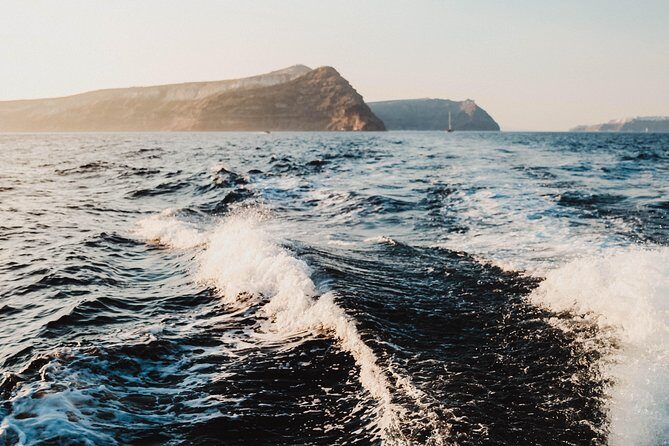 Santorini Private Catamaran Cruise with BBQ, Open Bar & Transfers - The Sum Up