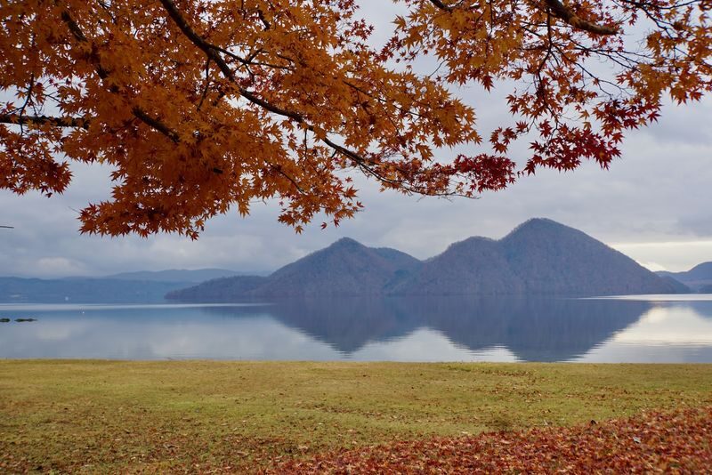 Sapporo Departure: Day Trip to Big Buddha, Jozankei, Lake Toya & Noboribetsu: Volcano/Lake View/Winter Snowmobiling - Hell Valley closes the day with a different kind of drama