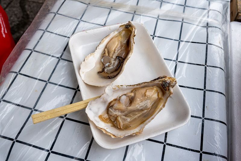 Sapporo Market & Seafood Brunch Tour: Taste Hokkaidos Freshness - Tanukikoji and Odori Park add city context