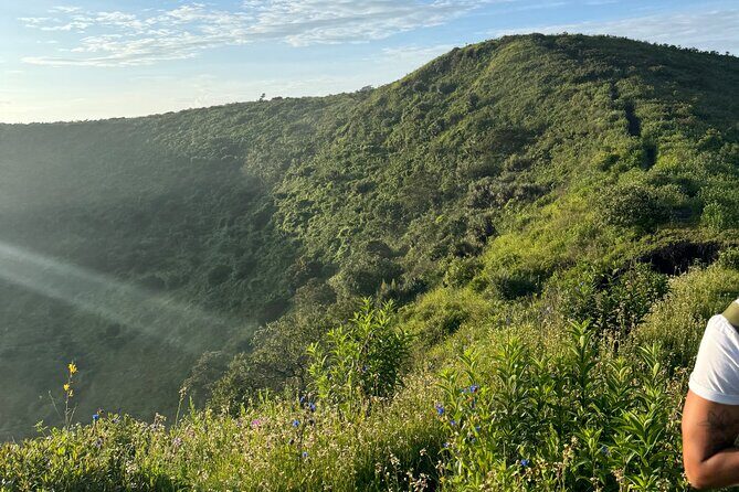 Scenic Cable Car Ride to the Citys Hidden Volcano - Key Points