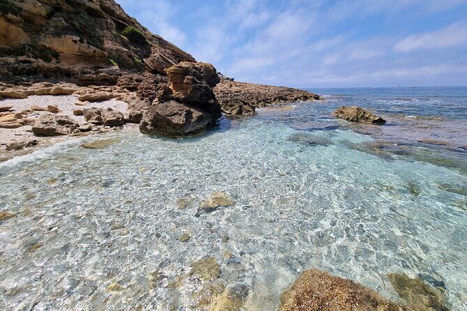 Secret Beaches and Coastal Tour by Land - Key Points