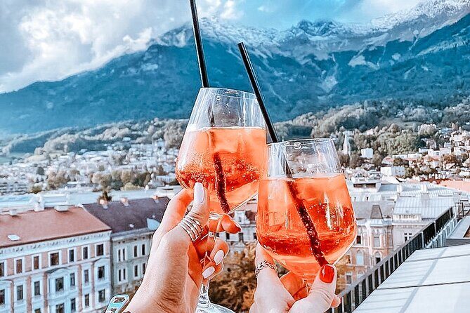 Self-Guided 1,5-hour Tour of Innsbruck: Exciting Stories, Photo Spots & Desserts - Scenic Photo Spots and Modern Architecture