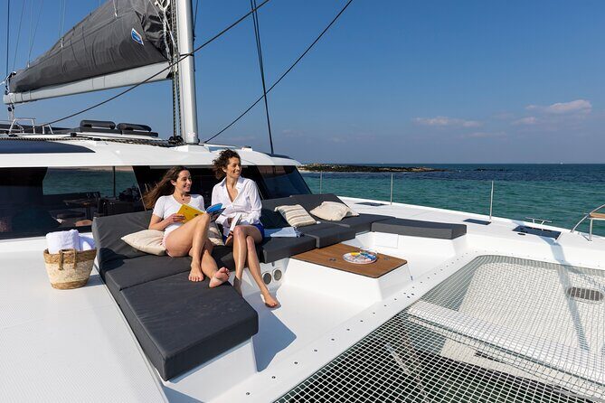 Semi-Private Brand-New Catamaran Cruise in Mykonos with Meal, Drinks & Transport - The Sum Up