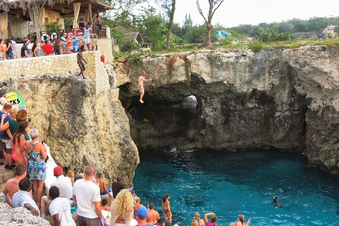 Seven Mile Beach and Ricks Cafe Private Tour - Key Points