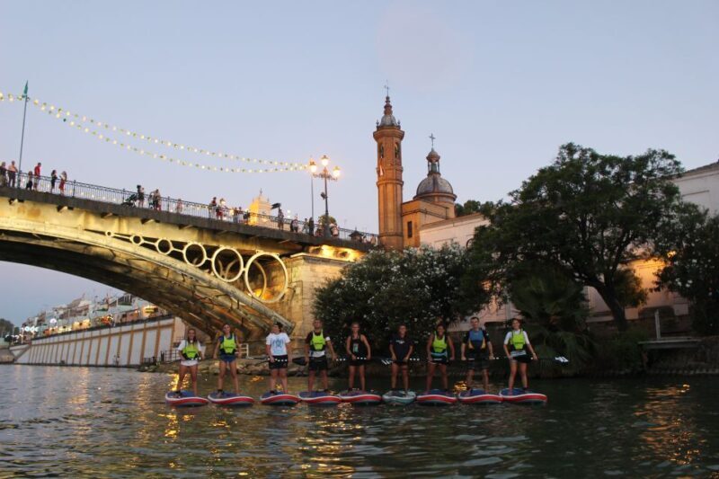 Seville: Sunset and Evening Paddle Boarding Tour - The Experience in Context