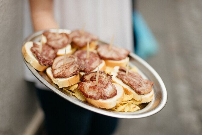 Seville's Triana Neighborhood Tapas & Wine Tour - The Sum Up