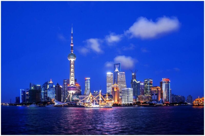 Shanghai: Night River Cruise Tour with Xinjiang Style Dining - Key Points