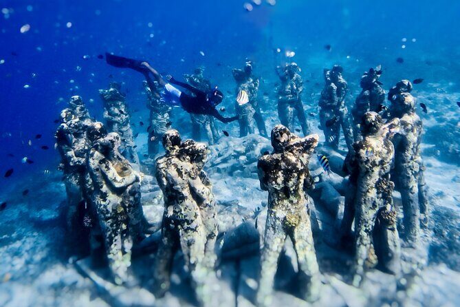 Snorkeling with turtle and statue in Gilis - An Authentic Gili Snorkeling Experience