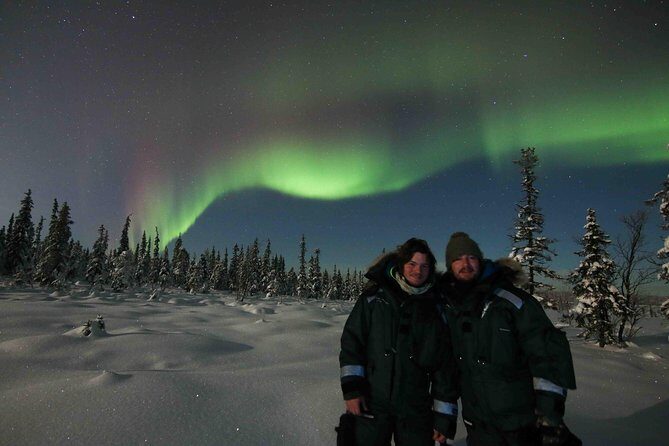 Snowmobile Aurora Expedition with dinner - The Snowmobiling Experience