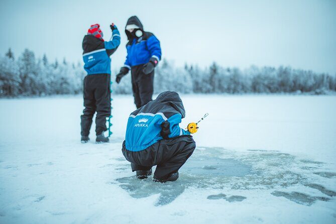 Snowmobiling and ice fishing in Apukka Resort, Rovaniemi - Warmth and Comfort: Bonfire and Refreshments