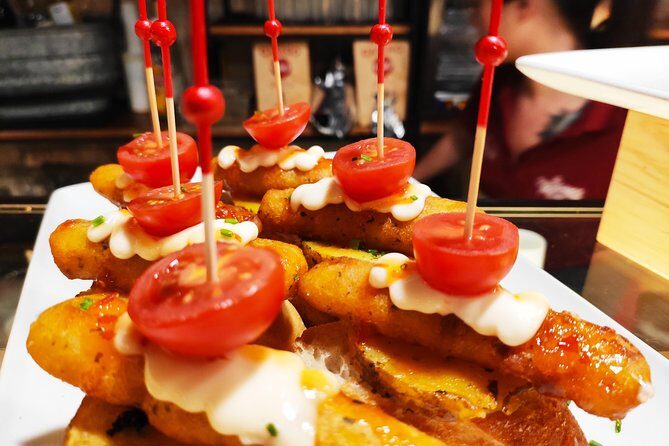 Spanish Wine and Tapas tour in a local Neighborhood in Barcelona - Key Points