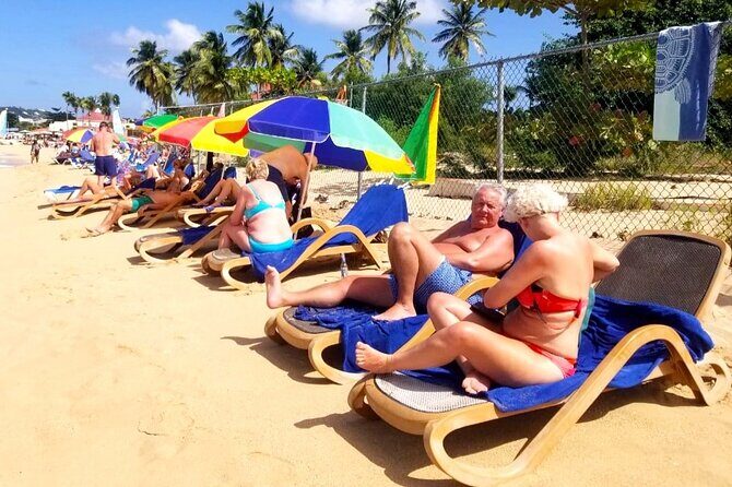 St. Lucia Beach Day with Paradise Beach Comforts & Transportation - Key Points