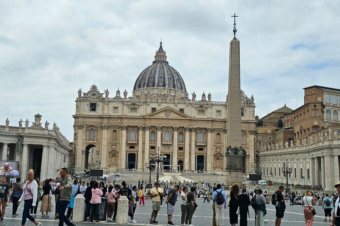 St. Peter's Basilica Dome to Underground Grottoes Tour - Meeting in St. Peters Square: The Heart of Vatican City