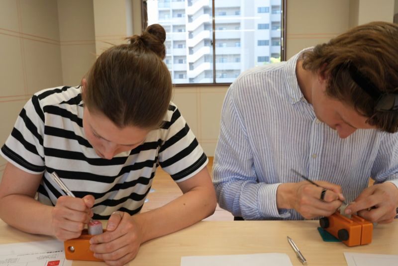 Stamp Making Experience in Osaka - Optional side carving and the final red-ink test