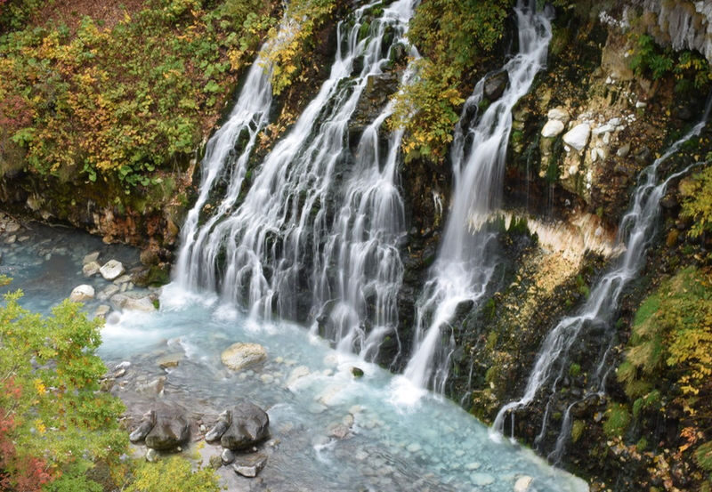 Summer 11 AM Departure: Shikisai no Oka & Farm Tomita & Blue Pond & Waterfall & Ningle Terrace Illumination Day Tour - Blue Pond: a short look at Biei’s famous water