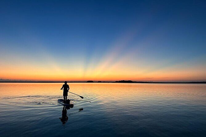 Sunrise on Paddleboard with breakfast in the lagoon of 7 colors - A Quiet Dawn on Bacalar’s Lagoon: Paddleboard and Breakfast at Sunrise