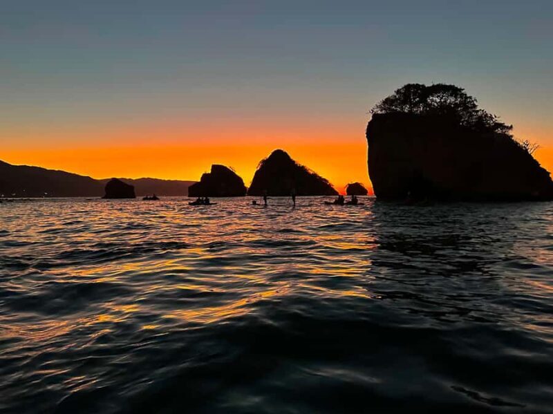 Sunset and Bioluminescence Boat Tour at Los Arcos Islands - Key Points