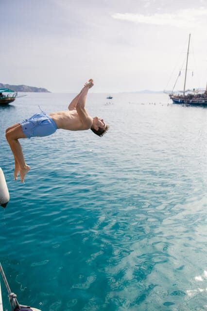 Sunset Dinner Cruise: Swim Stop, Drinks & Onboard Dining - Authentic Experiences and Traveler Insights