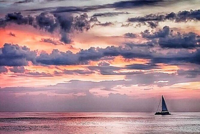 Sunset & Dolphin Sightseeing Sail Aboard the Lazy Daze Catamaran - The Sum Up