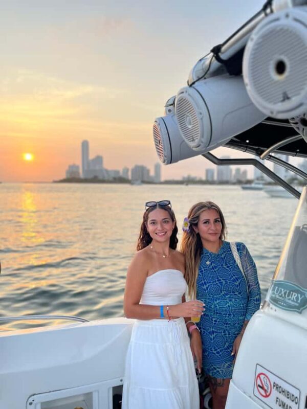 Sunset Party open bar on the bay while sharing with locals - Authentic Local Experience