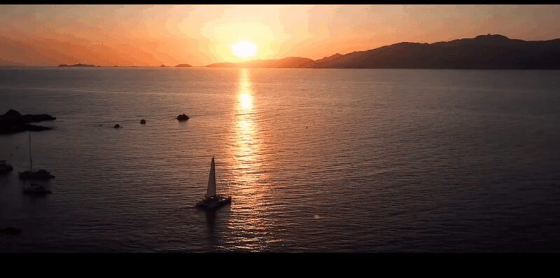 Sunset to Corsican song on a catamaran - Key Points