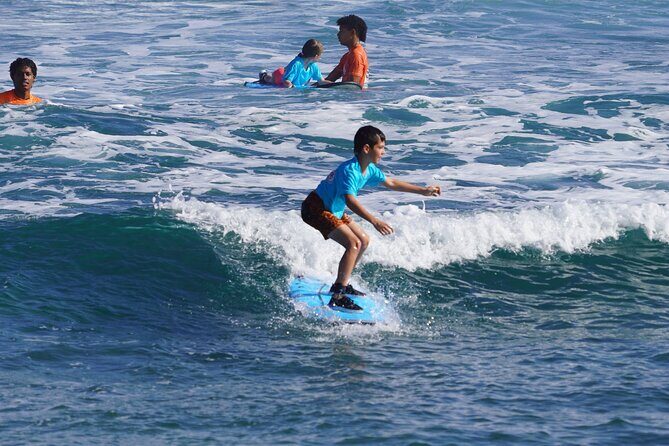 Surfing lesson at beautiful beach Playa Encuentro - FAQ: Your Questions Answered