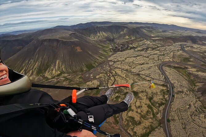 Tandem Paragliding over the Rugged Lava Fields at Blue Mountains - The Scenic Ascent to Takeoff