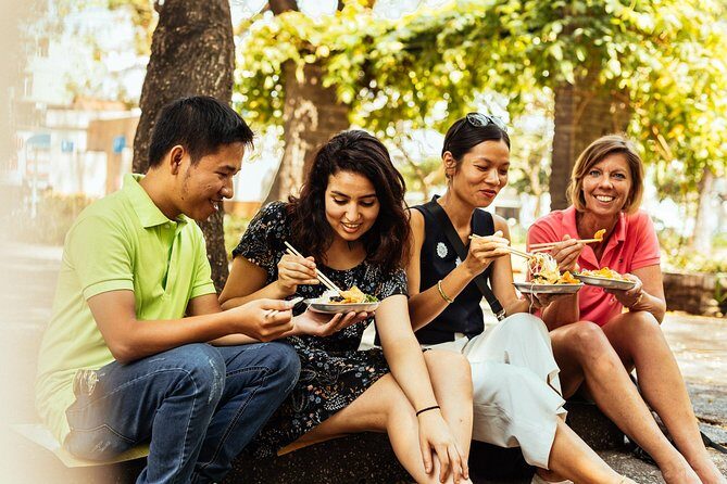 The 10 Tastings of Ho Chi Minh City With Locals: Private Street Food Tour - Walking Through Ho Chi Minh City’s Food Scene