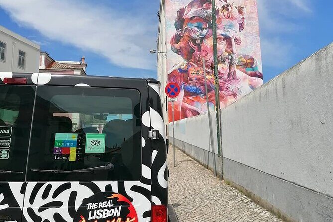 The Real Lisbon Street Art Private Guided Tour by Minivan - The Experience in Detail