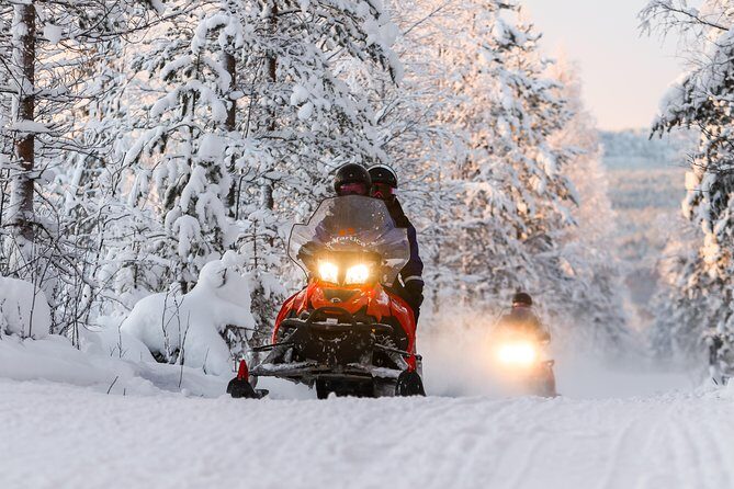 To the Kingdom of Snow and Ice  Full day snowmobile safari to ice hotel - Discovering the Arctic in Style: Snowmobile Safari to the Ice Hotel