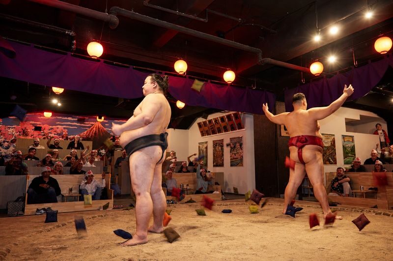 Tokyo Ginza Sumo Experience: Performance vs Pure Practice - A Ginza basement, with a ring at its center