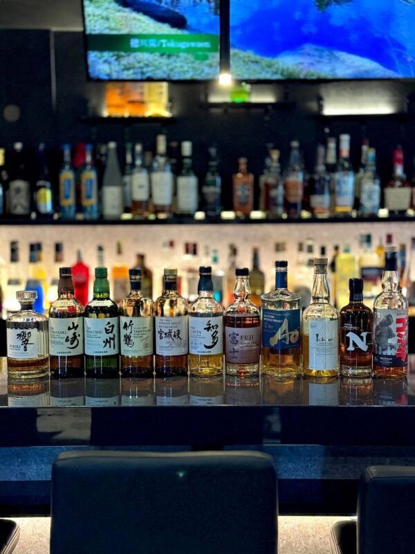 Tokyo: Japanese Whisky Tasting Experience: 10 Whiskies & 5 Snacks - BAR G.O.A.T. is the whole setting